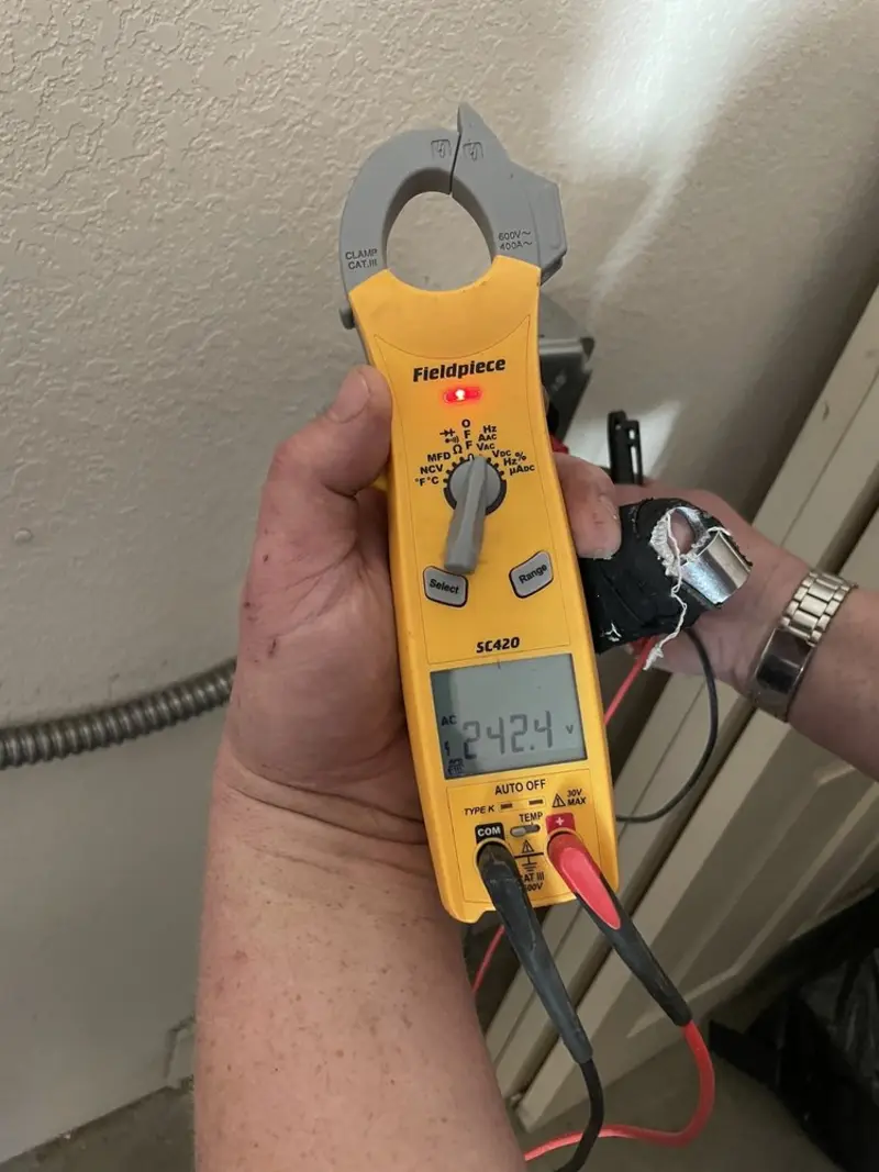 Voltage testing with clamp meter during Generator Installation in Imperial